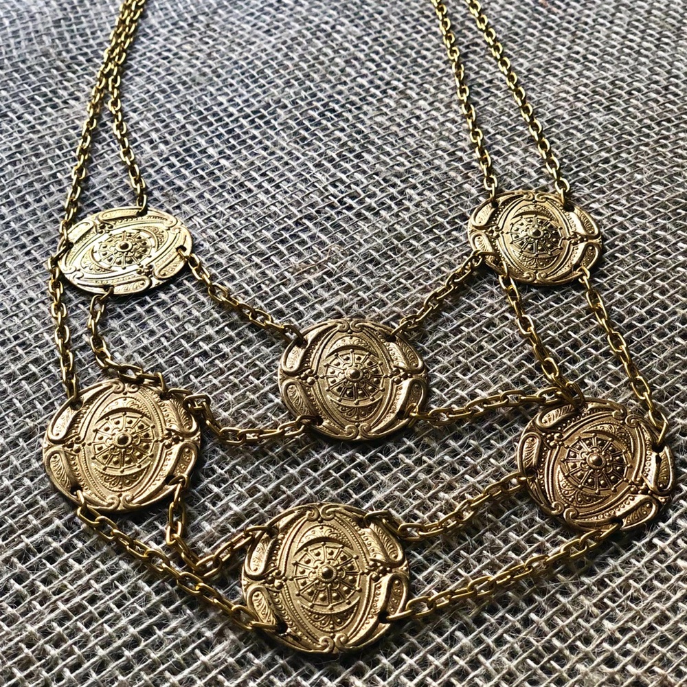 Yellow gold tone multi layer chain necklace